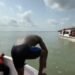 PHOTOS | Man Swims 3rd Mainland Bridge Lagoon to Raise Mental Health Awareness Campaign | METROWATCH