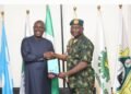 *Chief of Defence Staff, Gen Chris Musa (r) and Minister (state) Petroleum Resources, Senator Heineken. Lokpobiri (l)