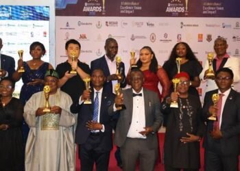 Some awardees at the 2026 Business Times Real Estate & Construction Excellence Awards event

held in Lagos Thursday. Third Right is the Director, Administration, Julius Berger Nigeria PLC,

Dr. Abdulaziz Isa-Kaita displaying the plaque of the Award won by the company.